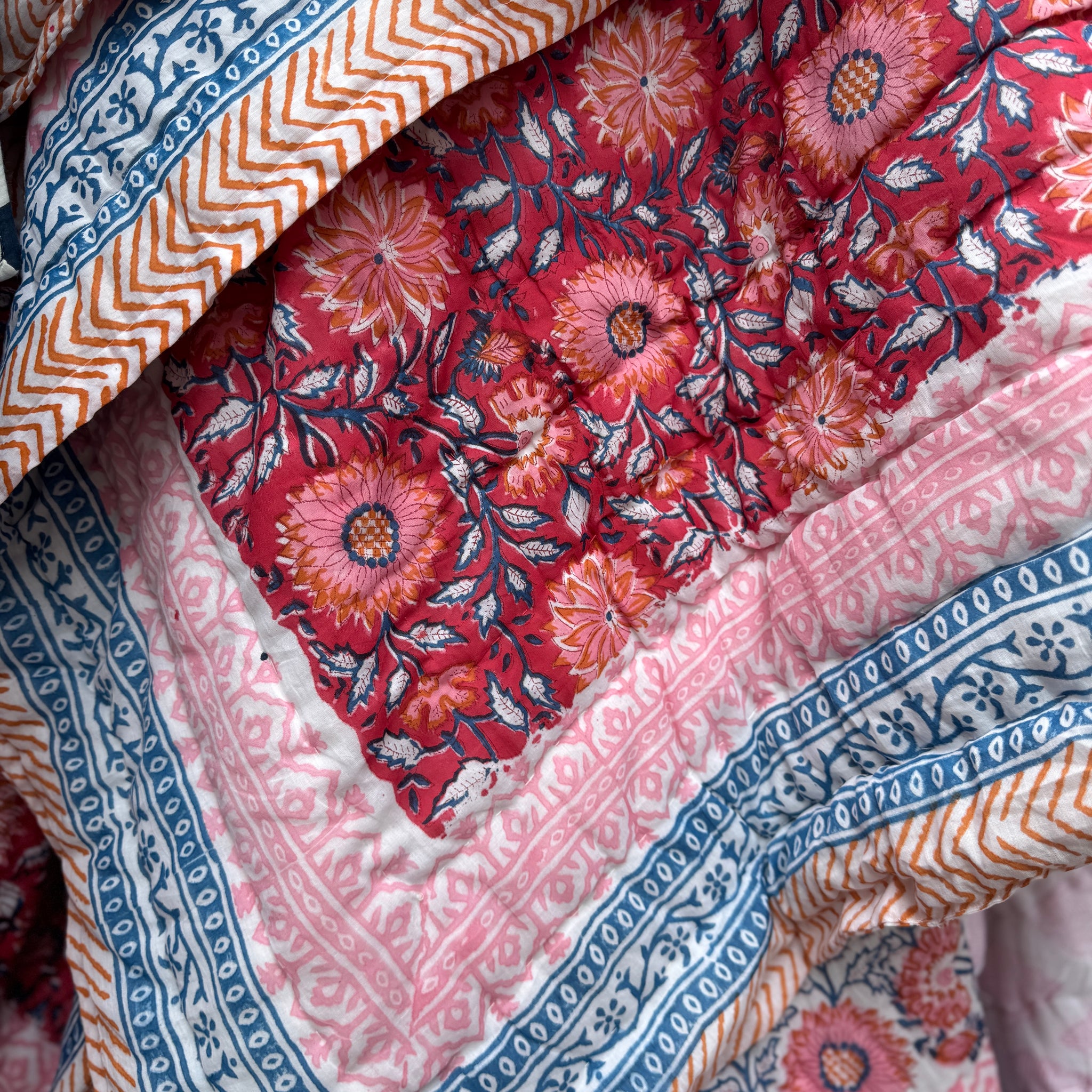 Red, blue and Pink Block Print Reversible Quilted Blanket